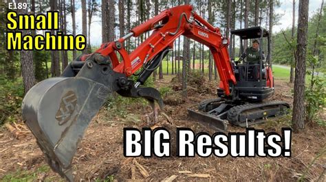 what can mini excavators do with stumps when clearing land|kubota kx71 stump digging.